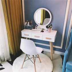 Photo of a dressing table in the bedroom with a mirror