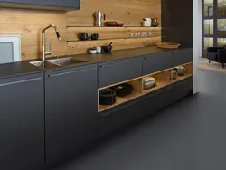 Gray kitchen with wooden facades photo