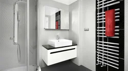 Electric heated towel rail in the bathroom interior photo