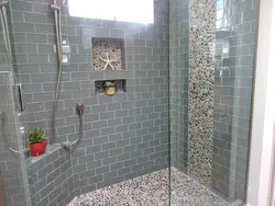 Bathroom with tile shower without tray design