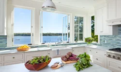 Kitchen design with panoramic windows in a modern style photo