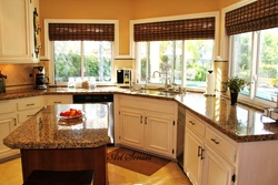 Kitchen design with panoramic windows in a modern style photo