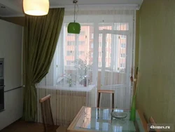 Modern window design with balcony in the kitchen