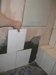How to properly lay tiles on a wall in a bathroom photo