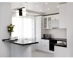White kitchen design with breakfast bar