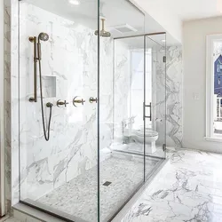 Bathroom design with shower and toilet in marble