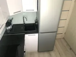 Small kitchen design with refrigerator photo