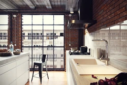 Photo of a kitchen with a loft style window