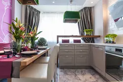 Kitchen interior with balcony and sofa photo