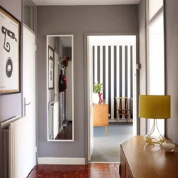 Wall-mounted full-length mirror in the hallway photo in the interior