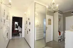 Wall-mounted full-length mirror in the hallway photo in the interior