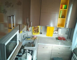 Brezhnevka kitchen design with refrigerator photo