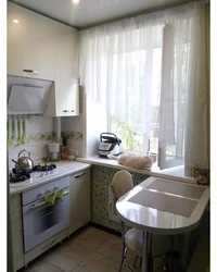 Brezhnevka kitchen design with refrigerator photo