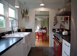 Design Of A Narrow Kitchen In A House With A Window