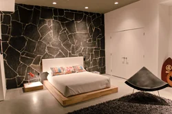 Bedroom design with stone on the wall