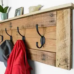 DIY hangers for the hallway made of wood photo