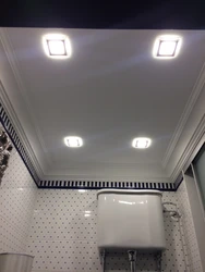 Lamps in the suspended ceiling in the bathroom photo