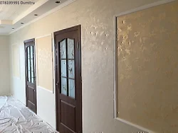 Decorative plaster wet silk in the interior of the hallway photo