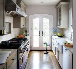 Kitchen design with a window along a long wall