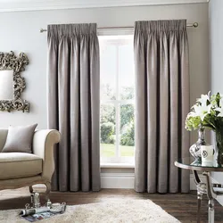 Colored curtains in the bedroom interior