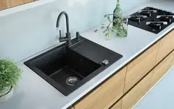 White sink in the kitchen interior