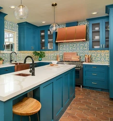 Kitchen with blue wallpaper design