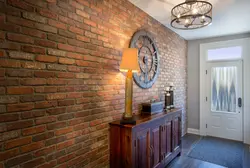 Wall with bricks in the interior in the hallway