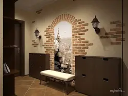 Wall with bricks in the interior in the hallway