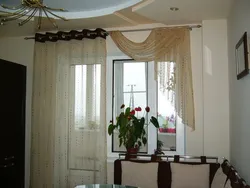 Curtains in the kitchen living room with a balcony photo