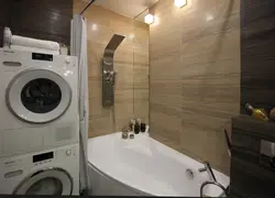 Стиралка и сушилка в интерьере ванной