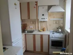 Kitchen 6 meters with refrigerator and column photo