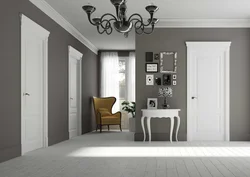 Apartment design with white floor and white doors