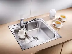 Stainless steel kitchen sink photo