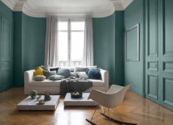 Combination of colors in the interior of the living room emerald