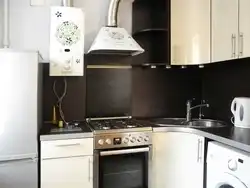 Kitchens in Khrushchev with a gas water heater and a refrigerator design 5