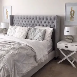 Bedroom interior with gray bed