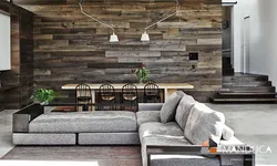 Living room with stone and wood photo