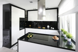 Black and white kitchen in the interior real