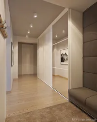 Design Of A Narrow Hallway In An Apartment With A Wardrobe In A Modern