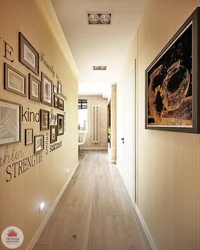 Paintings in a small hallway interior