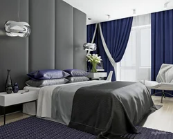 Дизайн спальни с синими шторами фото