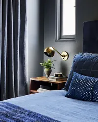 Дизайн спальни с синими шторами фото
