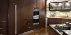 Убудаваны халадзільнік у інтэр'еры кухні фота