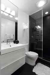 Photo of a bathroom and toilet in white