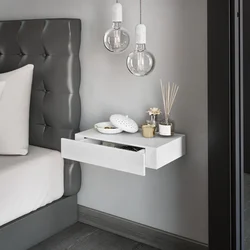 Photo of hanging bedside tables in the bedroom