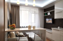 Kitchen interior with sofa and TV photo