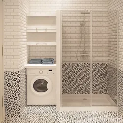 Bathroom interior with shower screen and washing machine