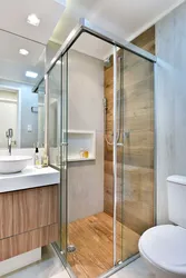 Bathroom Interior With Shower Screen And Washing Machine