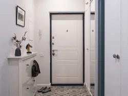Entrance door in a small hallway photo