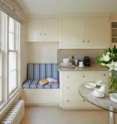 Interior of a small kitchen with a sofa